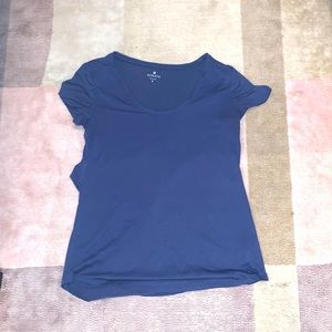 Athleta dry fit navy shirt with cut out back detail.